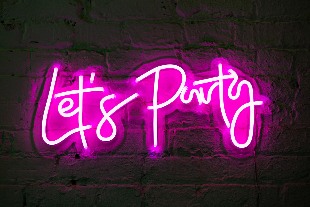 Lets party pink glowing neon sign banner